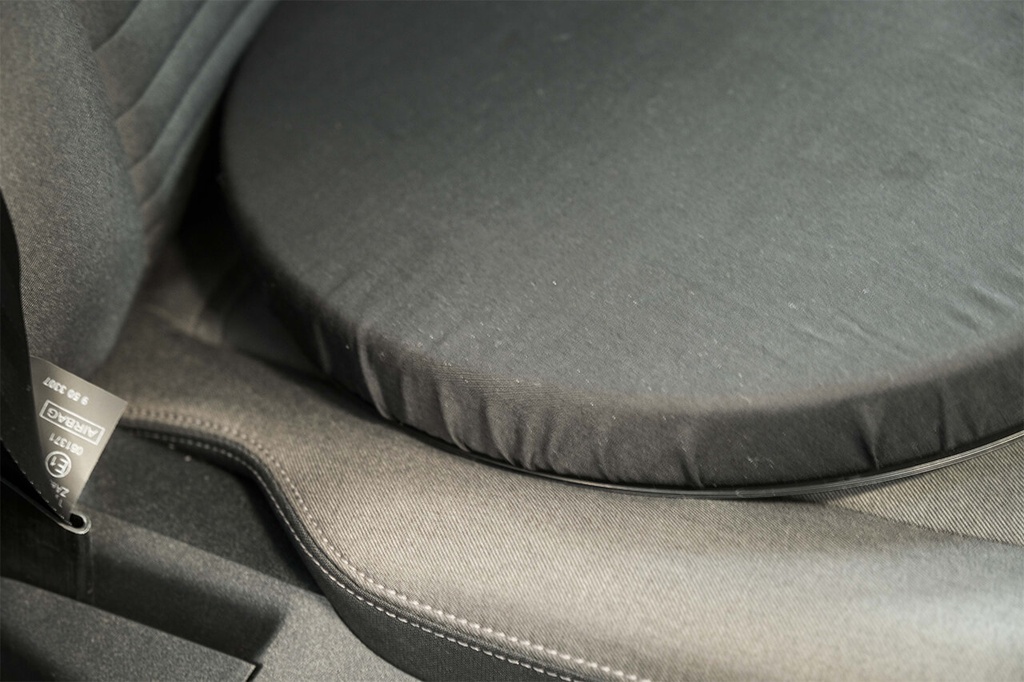 Coussin pivotant capitonné