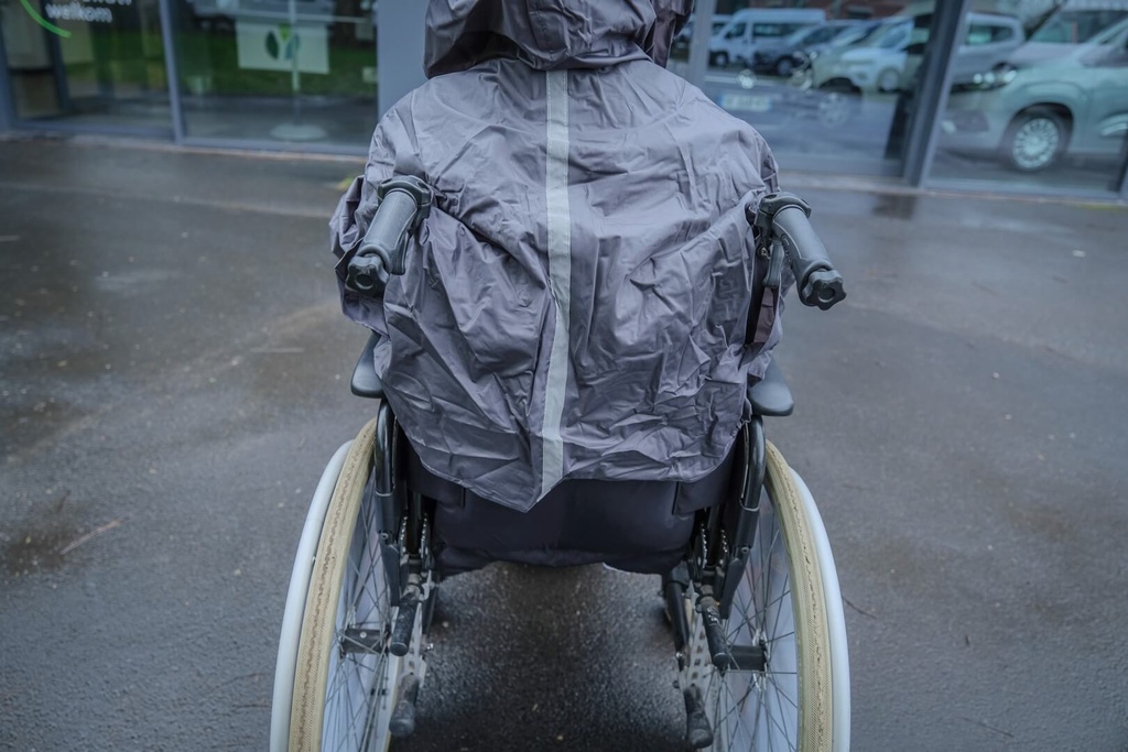 Vêtement de pluie avec manches pour fauteuil roulant