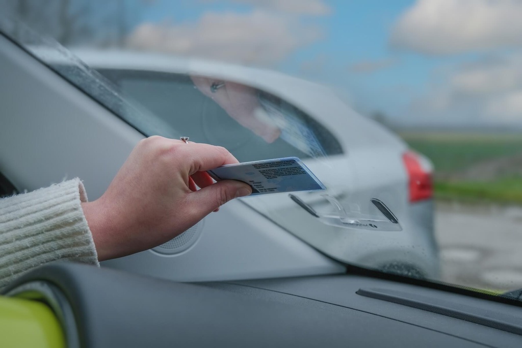 Support pour carte de stationnement handicap